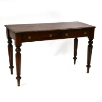 Mid 19th Century Mahogany side table with deep reeded legs and two drawers. W 123cm, D 50cm, H 75cm.