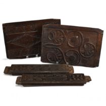 A group of mid 17th Century carved oak elements consisting of 2 x fielded panels and 2 x uprights...