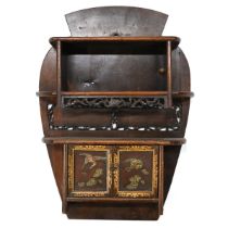 A late 19th Century Japanese hanging wall cabinet. Small cupboard below with brass and copper fly...