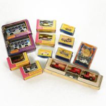 Group of boxed Matchbox cars and buses including Ford Mustang, Jubilee & Wedding Buses and Models...