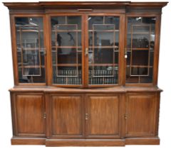 A large late Victorian Mahogany breakfront bookcase marked for Waring & Gillow c1890s. Panelled c...