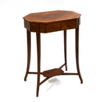 An early 20th Century Mahogany sewing or cutlery table with boxwood inlay. The top lifts to revea...