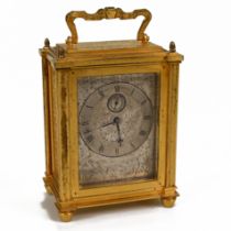 A small 19th Century Hunt & Roskell carriage clock in gilt brass case. The silver dial engraved w...