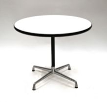 Vitra meeting table designed by Ray and Charles Eames. White top with black stem and aluminium fe...