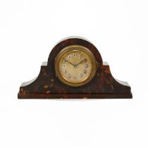 A small late 19th century single train mantle clock with platform escapement movement in a tortoi...