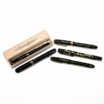 A collection of five fountain pens including a Dickinson Croxley and four Conway Stewart all with...
