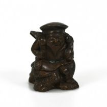 A 20th century Japanese bronze of Ebisu, the god of fisherman and one of the seven gods of luck, ...