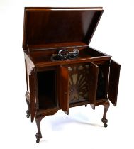 1930's cabinet gramophone by Mickelburgh, Bristol. Mahogany case with central fretwork horn cover...