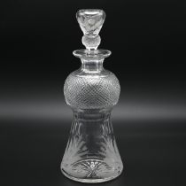 An Edinburgh Crystal thistle shaped glass decanter with original stopper. Engraved to base "Made ...