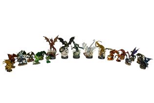 A collection of 33 resin model of dragons, including Bradford Exchange.