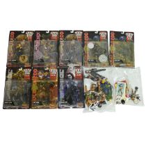 2000AD Judge Dredd Collectors Toy Figures (8). 2x carded and sealed, 6x loose but with boxes pres...