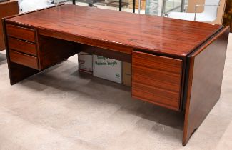 A Dyrlund "Skyline" Danish rosewood executive desk, circa 1970's, with three drawers and a file d...