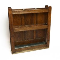 Arts and Crafts style oak panelled stick/umbrella stand with metal drip tray. H 68cm, W 61cm, D 1...