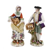 A pair of Ludwigsburg (1758-1824) porcelain figurines of bird sellers with marks to the underside...
