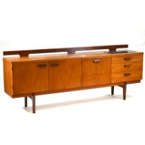 Teak Mid Century Uniflex sideboard with black marble inset by Gunther Hoffstead. Double door cabi...