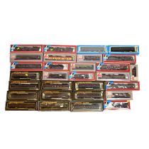 Toy train accessories. Quantity of boxed 00 gauge train carriages and rolling stock. All LMR colo...