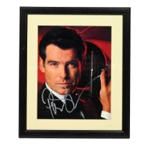 Signed Pierce Brosnan as James Bond 007 photograph. Certificate of Authenticity to reverse. W 29c...