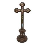 Roman Pilgrimage Micro mosaic brass cross, 20th Century, featuring in inset relief four Pilgrim C...
