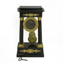 19th Century French Portico Clock of ebonised wood with gilt brass mounts and dial surround, silv...