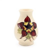 Moorcroft "Columbine" pattern posy vase - mid 20th century. Height 10cm, diameter 6cm.