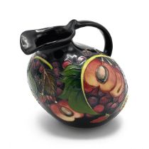 A Moorcroft bird shaped ewer in the Queen's Choice pattern by Emma Bossons FRSA 2000, shape 28/75...