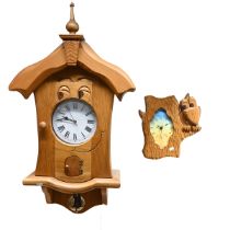 Two late 20th oak battery quartz movement character clocks, the first with a pendulum, roman nume...