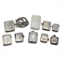 A collection of 8 silver vesta cases, along with a silver fob chain and silver case with a plasti...