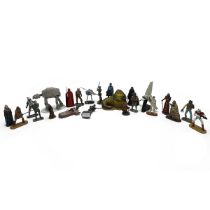 A large collection of Star Wars cast models and figures
