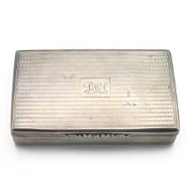 A Victorian silver box, with engine turned lid and base with reeded decoration and a gilt interio...