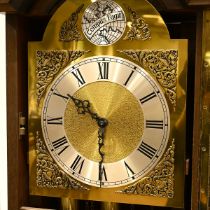 An Oak longcase "Grandmother" clock by Pallesgaard of Copenhagen with three train movement, brass...