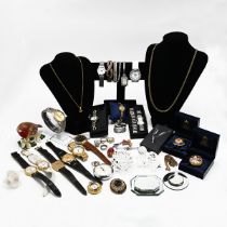 A collection of mixed costume jewellery including various bangles, watches and other items