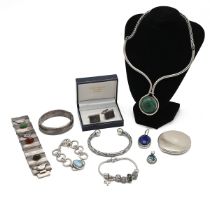 A collection of miscellaneous silver jewellery to include a malachite set choker, Magnus Maximus ...