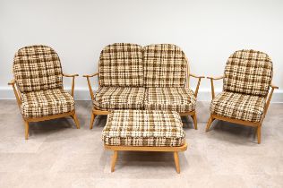 Ercol blonde beechwood suite, in the Windsor range, comprising two-seater sofa, two armchairs and...