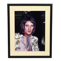 Framed signed photograph of Rod Stewart. Certificate of Authenticity to reverse. W 44cm, H 54cm.
