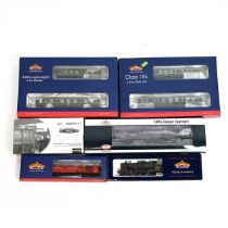 Quantity of boxed Bachmann 00 gauge toy Model Railway Locomotives and carriages. All LMS colours....