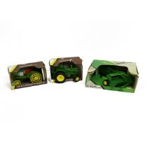Boxed John Deere die-cast toy model Tractors: 1953 Model 'D'; 1915 Model 'R' Waterloo Boy; Model ...