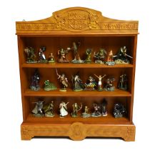 A complete set of 25 Danbury Mint Lord Of The Rings figures, with the original wooden display case