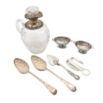 Two silver George III berry spoons, along with a pair of silver salts, silver trowel, silver shoe...