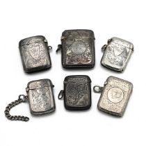 A collection of 6 Victorian and later silver engraved vesta cases, 129 grams