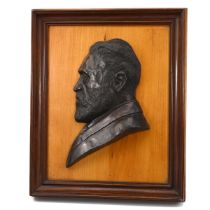 A 19th century bronze relief of a male, bearing a signature to the base, possibly by John Ayres H...