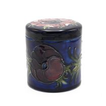 Moorcroft Anemone on blue ground lidded pot, mid 20th century. Lid bears old repair. There is a s...