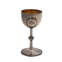 A Victorian silver gothic miniature cup, with gilt interior and engraved initials "IHS" within a ...
