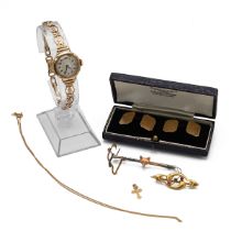 A collection of 9ct gold jewellery to include a 9ct gold watch and strap, cufflinks, bar brooch a...