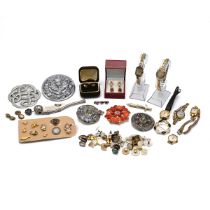 A collection of costume jewellery including shirt studs, brooches, watches, Harrods box and other...