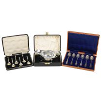 A set of silver seal top spoons, London 1936, Thomas Bradbury & Sons Ltd, along with a set of sil...