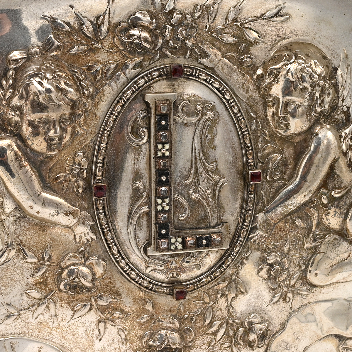 A 19th century silver Hungarian marriage tray, decorated in relief with winged cherubs, the styli... - Image 3 of 3
