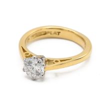 An 18k yellow gold and diamond solitaire ring, set with a round brilliant cut diamond (0.64ct), c...