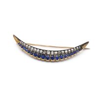 A Victorian 14ct yellow gold diamond and sapphire crescent brooch, set with twenty graduated old ...