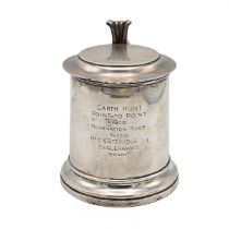 A George V silver tankard, of tapering cylindrical with a raised hinged cover, with an S-scroll h...