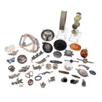 A collection of Victorian and later jewellery, including Scottish silver, enamel and hardstone br...
